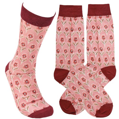 Pink floral crew socks with red cuff heel and toe